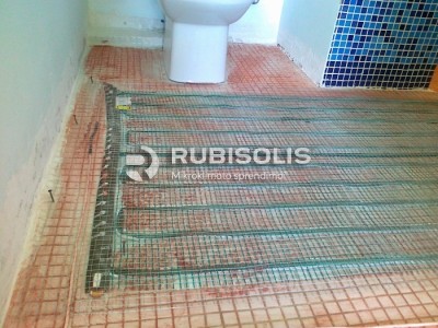 NAMO ŠILDYMAS VILNIUJE (GRINDŲ ŠILDYMAS GENIUS CARBON)